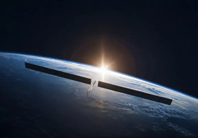 The deployed AI1 orbital data center satellite features extended thermal radiators and Starlink V3 technology.