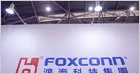 Server racks with Intel Xeon processors and AI chips are shown at a Foxconn and Intel joint development event.
