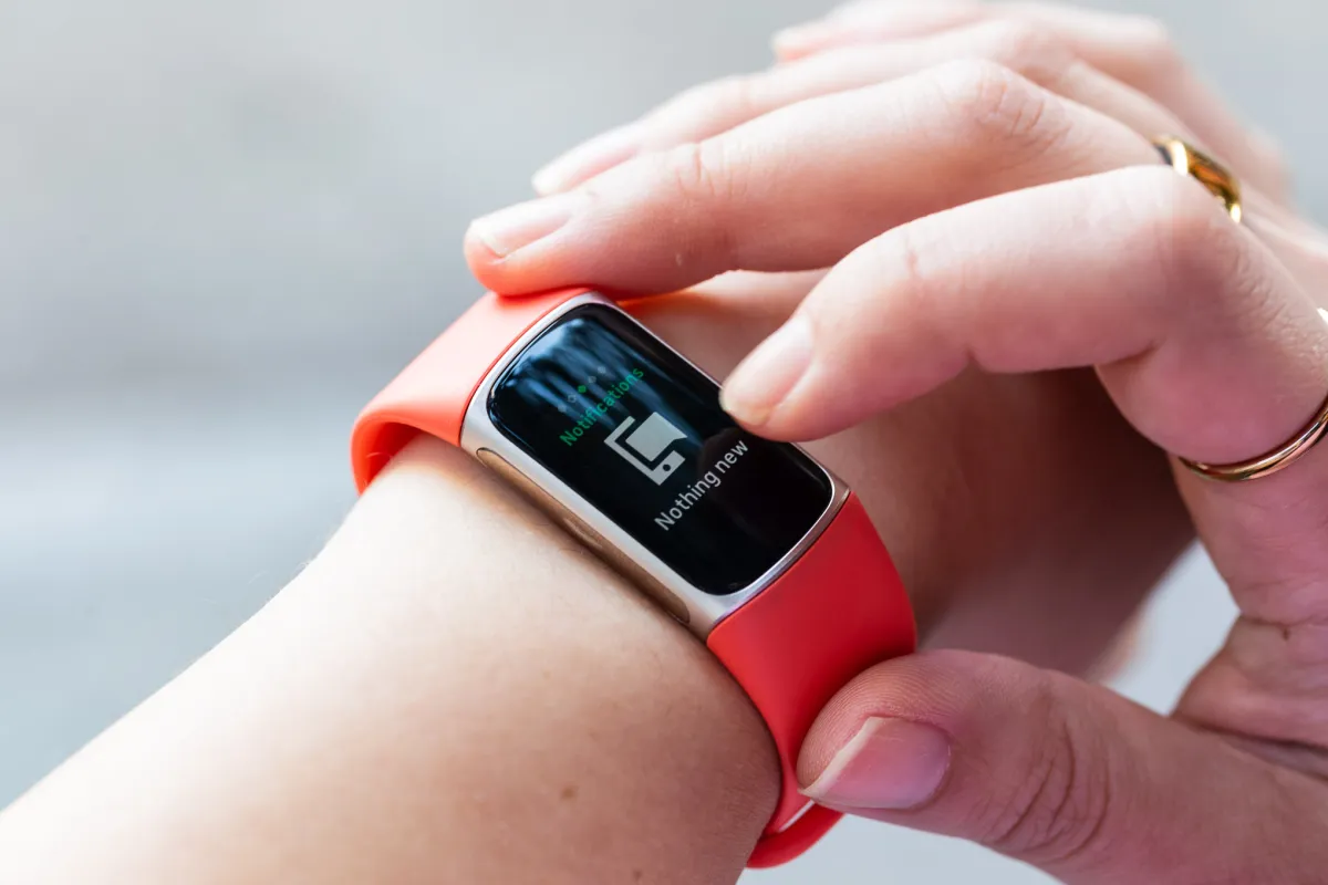 Fitbit Charge 6, Fitbit Air, and Fitbit Ace LTE devices displayed together for pricing comparison