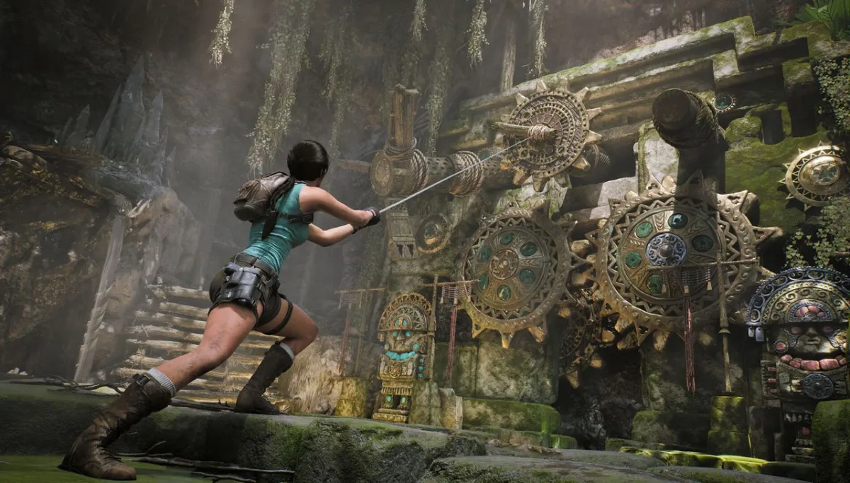 Lara Croft explores ancient ruins while solving puzzles and engaging in combat within the reimagined Tomb Raider game.