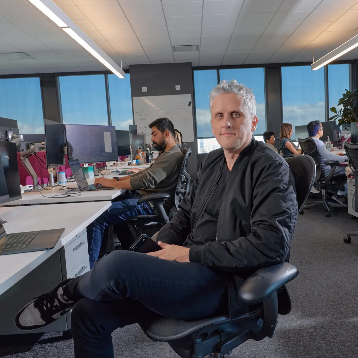 Technology professionals collaborating on artificial intelligence projects