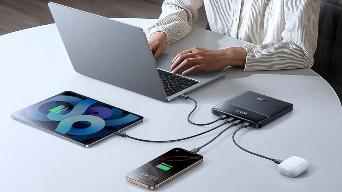 The Baseus Blade 100W power bank features a flat design, four ports, and twenty thousand milliamp hours capacity.