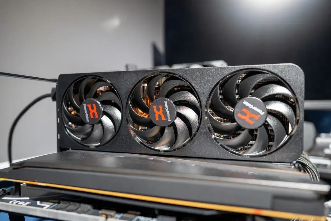 The AMD Radeon RX 9070 GRE graphics card is shown.
