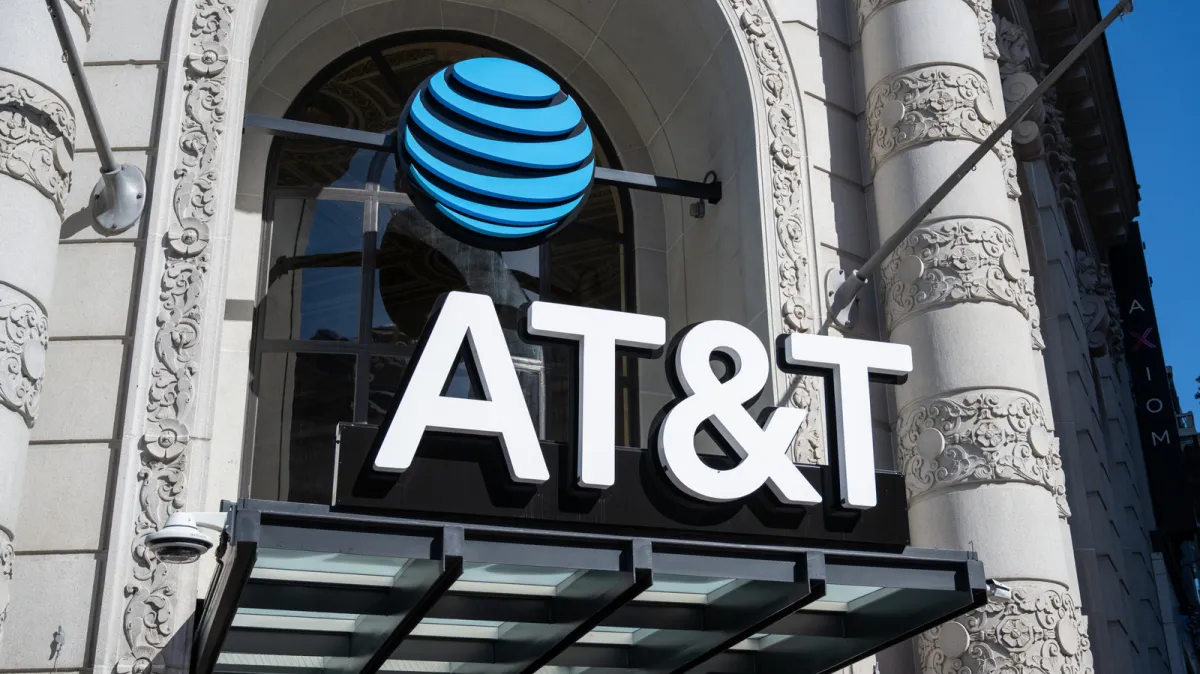 An iPad screen displays the AT&T daily data pass activation interface.