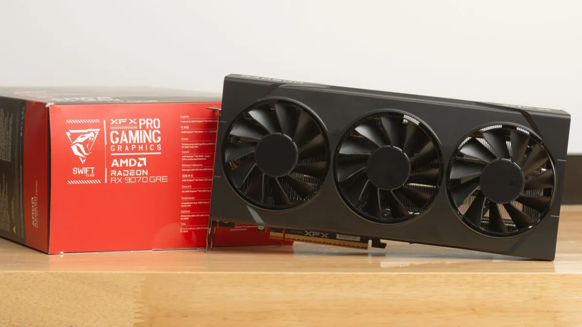 The AMD Radeon RX 9070 GRE graphics card is displayed with its cooling fans and branding clearly visible.