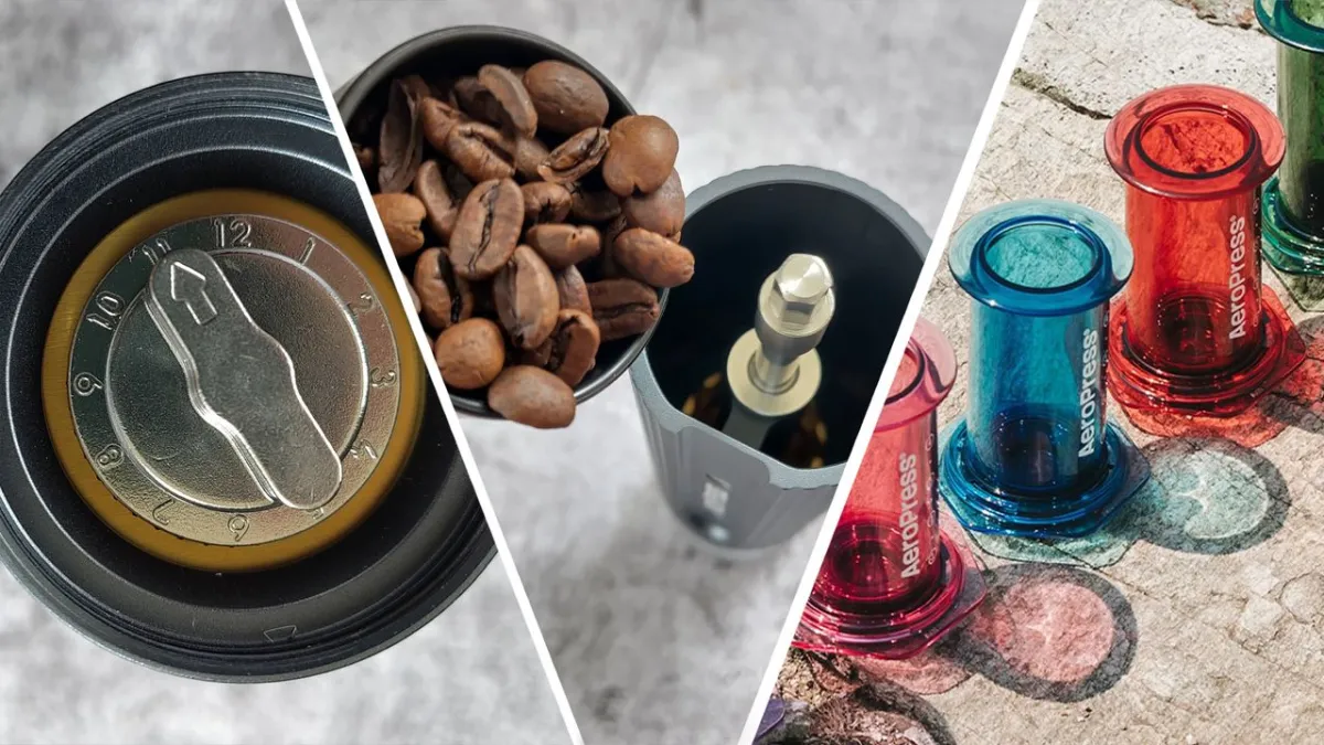 The AeroPress manual coffee brewer rests on a countertop with its filter cap and plunger attached.