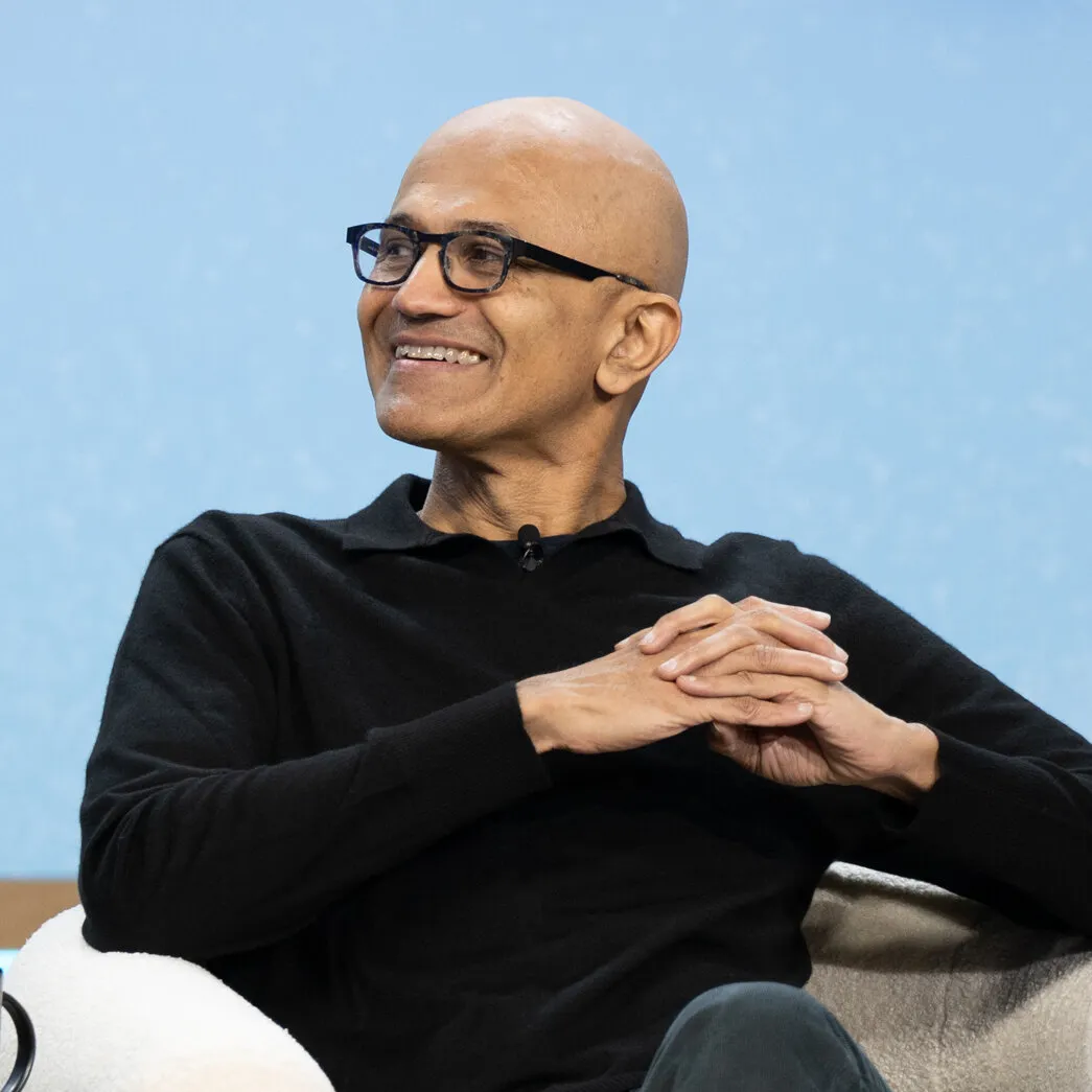 Satya Nadella speaking at The New York Times Hard Fork Live event about artificial intelligence.