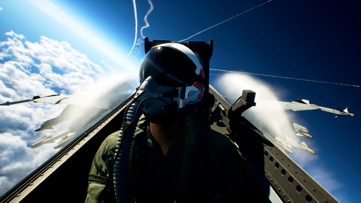 A fighter jet navigates through clouds during an aerial combat mission in Ace Combat 8.