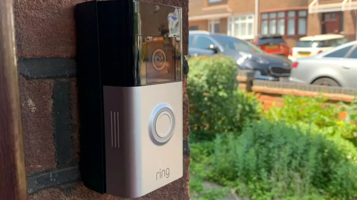 A Ring security camera displays facial recognition technology used in the Familiar Faces feature.