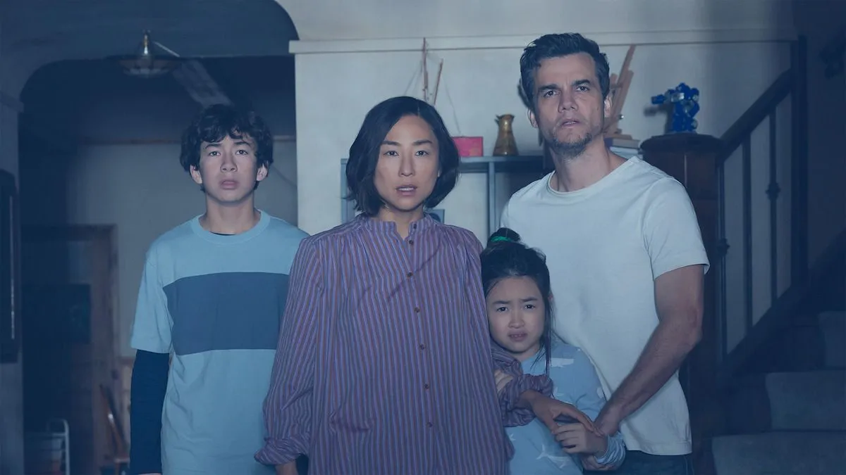 Promotional still from Netflix thriller The Last House depicting a family trapped inside their sealed home.