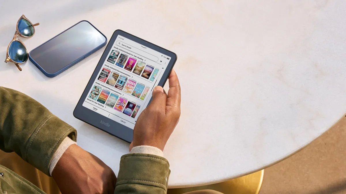 Smartphone showing Kindle Unlimited subscription settings and payment options