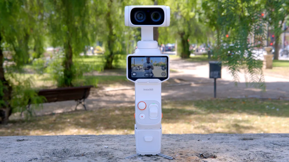 Insta360 Luna Ultra handheld gimbal camera with dual lenses and a detachable wireless display