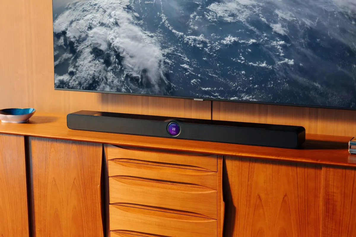 Front view of the WiiM Bar soundbar showing its eight-driver array and control interface.