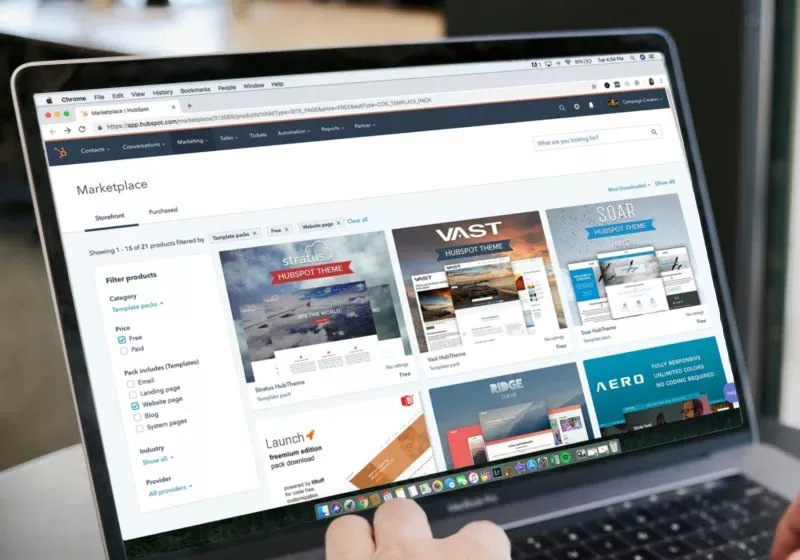 A monitor shows artificial intelligence shopping recommendations with alert symbols over fraudulent clone websites.