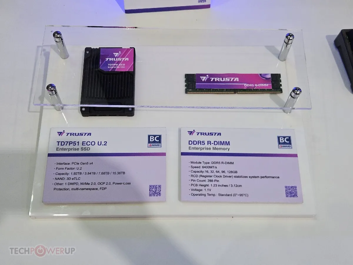 The exhibit showcases ADATA XPG DDR5 memory modules alongside TRUSTA enterprise storage drives.