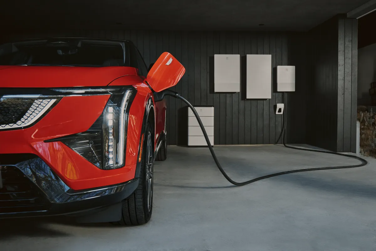 General Motors electric vehicle connected to a vehicle-to-grid charging station