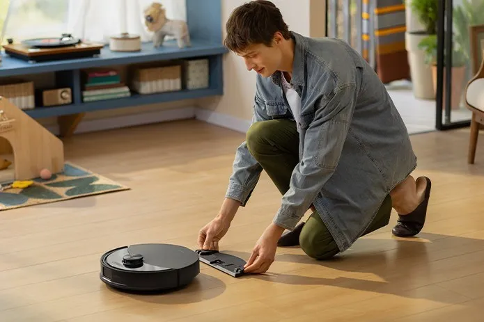 Roborock Q10 S5 Plus robot vacuum and mop hybrid with self-emptying dock.