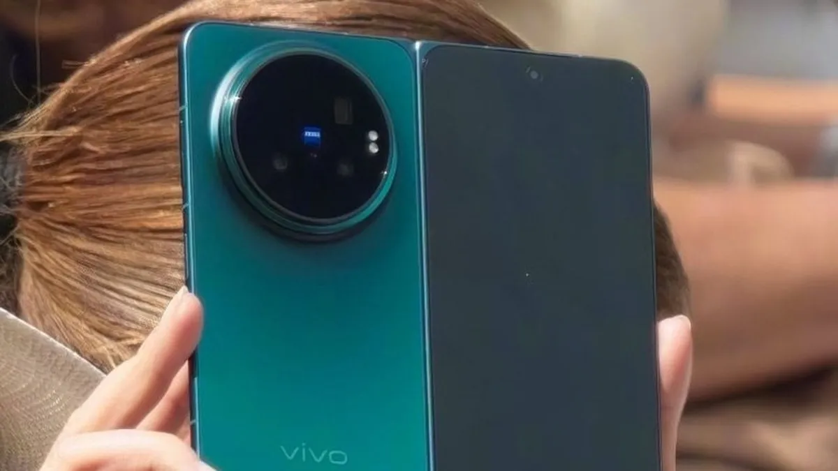 The Vivo X Fold 6 smartphone displays a cyan exterior finish.