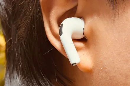 Apple AirPods feature integrated camera sensors for spatial computing and environmental recognition.
