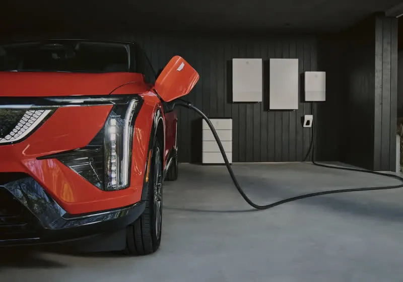 GM electric vehicle connected to a bidirectional charging station for grid integration