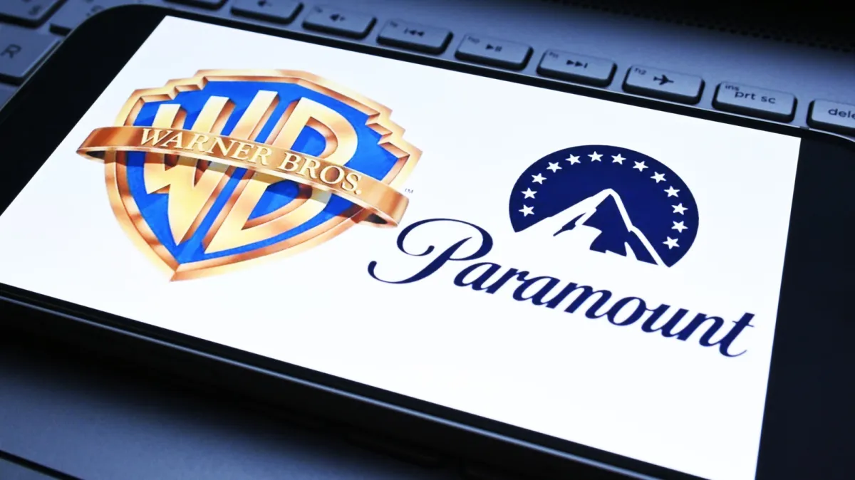 Logos of Paramount Skydance and Warner Bros Discovery displayed together to mark the approved merger