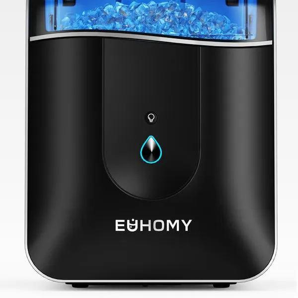 A modern crushed ice maker dispenses finely textured ice into a clear container.
