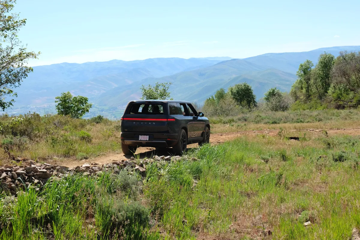 The Rivian R2 electric SUV features a dual-motor powertrain and a rugged exterior designed for off-road capability.