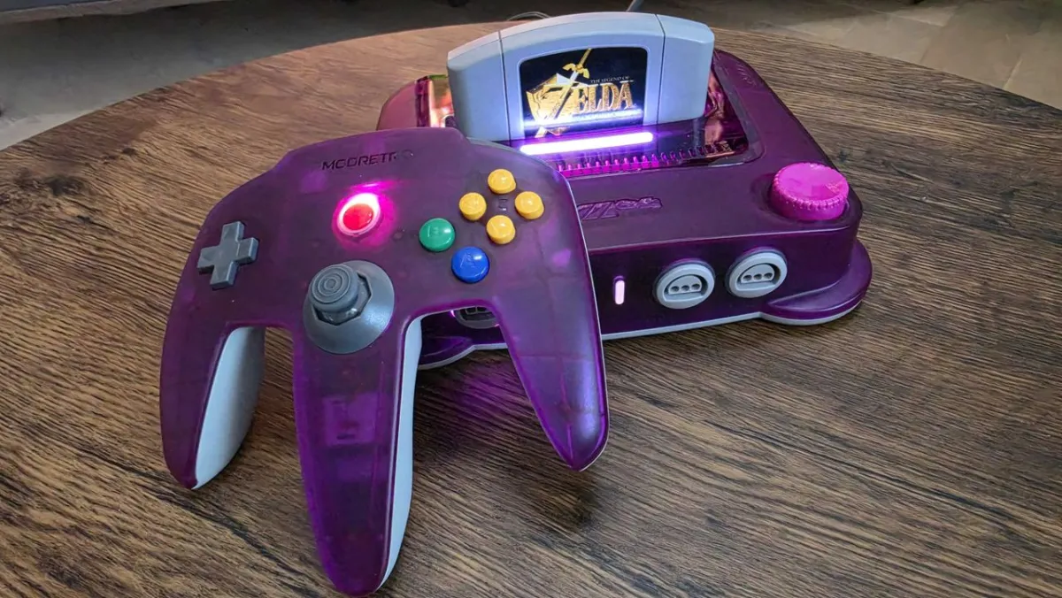 The ModRetro M64 console features an HDMI port and an original Nintendo 64 cartridge slot.