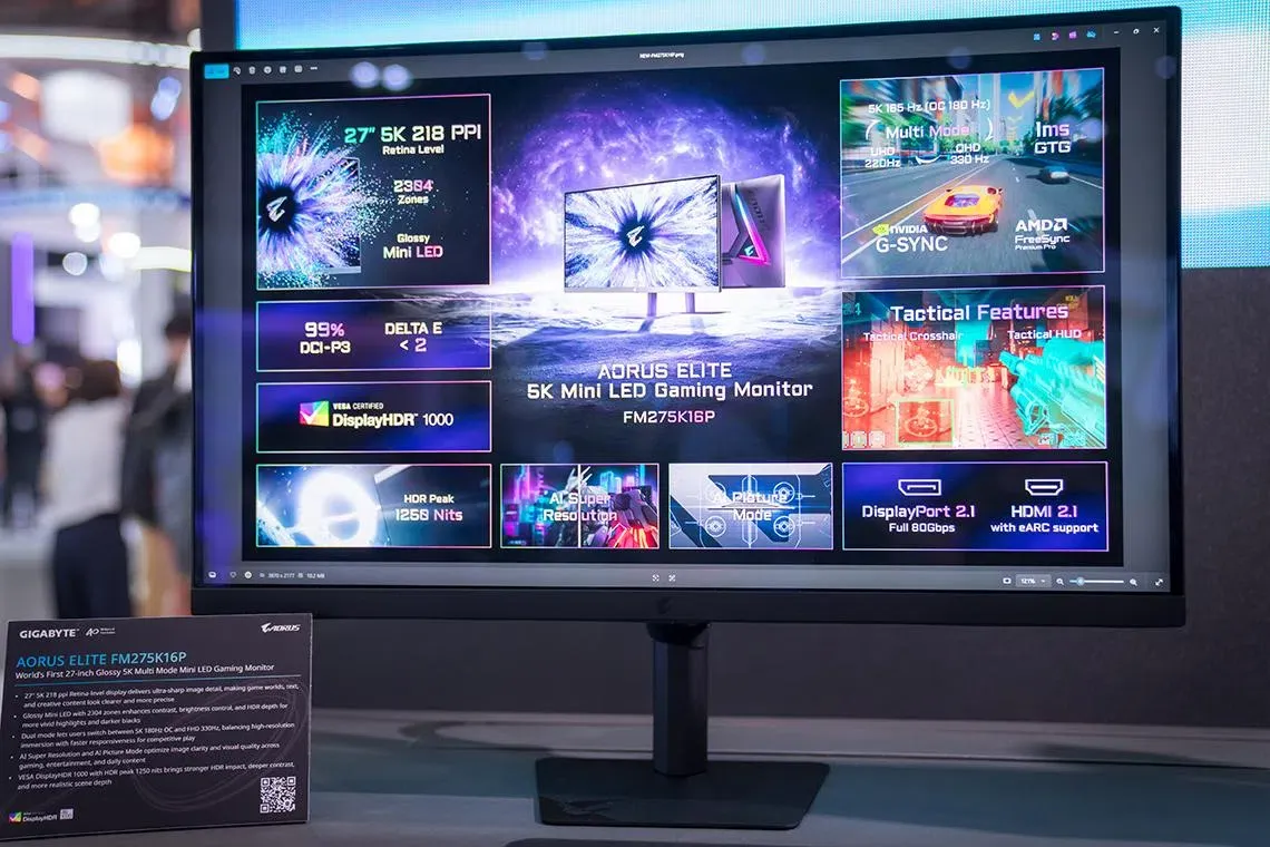 The twenty seven inch Gigabyte Aorus Elite 5K Mini LED monitor is shown from the front with its control panel visible.