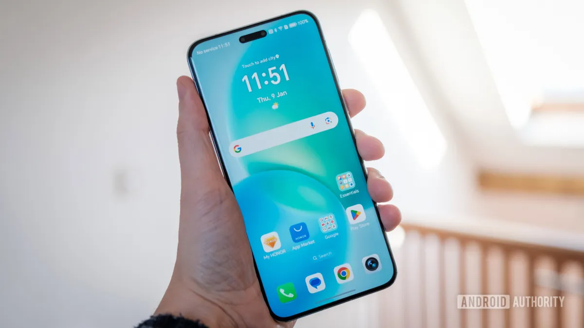 A smartphone display panel shows peak brightness specifications during technical testing.
