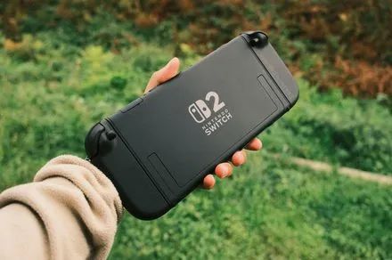The Nintendo Switch 2 console displays the newly designed user-replaceable battery compartment.