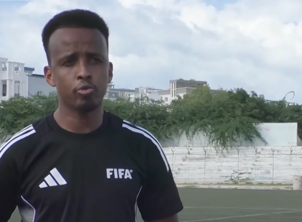Somali referee Omar Artan addresses supporters in Mogadishu following his denied US entry for the World Cup.