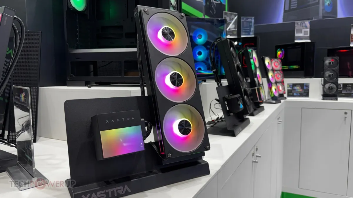 XASTRA hardware cases and liquid cooling units feature matte finishes and restrained lighting at Computex 2026.