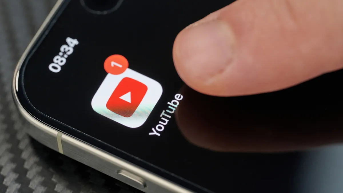 The YouTube interface displays the newly available picture-in-picture video playback feature for all users.