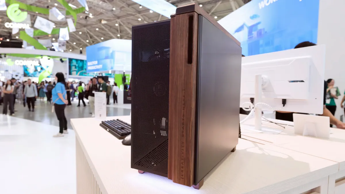 A Gigabyte PC case concept with wooden panels and tempered glass is displayed at Computex.
