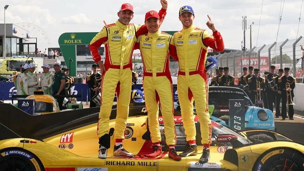 Racing cars competing at the Circuit de la Sarthe during the 24 Hours of Le Mans