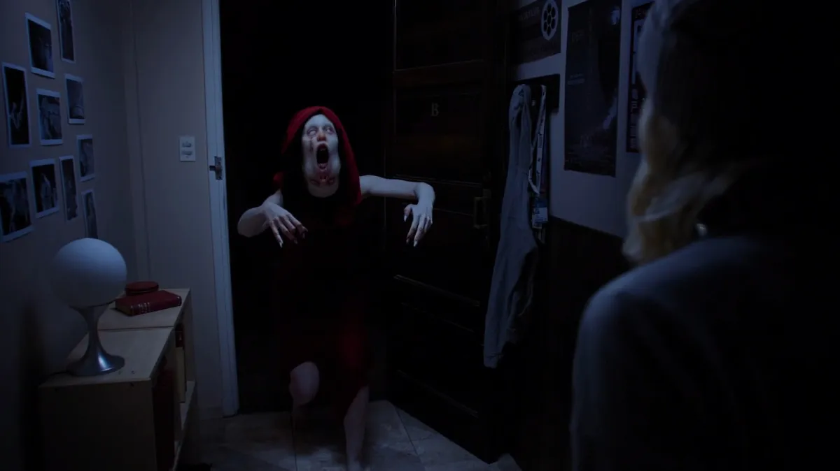 Tenebris Somnia gameplay blends retro pixel art environments with live-action horror cutscenes featuring protagonist Julia.