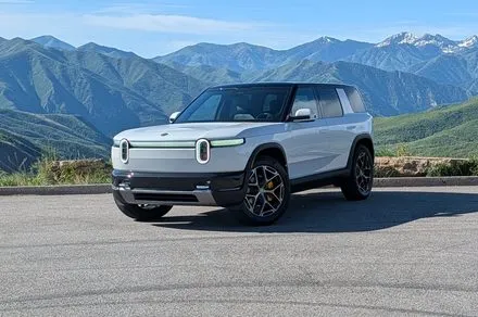 Rivian R2 two-row electric SUV displaying its boxy design and rugged profile.
