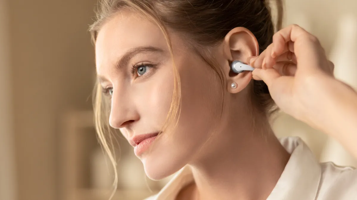 Shokz OpenDots 2 and OpenDots Air clip-on headphones with dual drivers and AI call noise reduction.