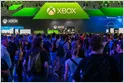 Xbox logos and Microsoft headquarters illustrate ongoing studio independence negotiations.