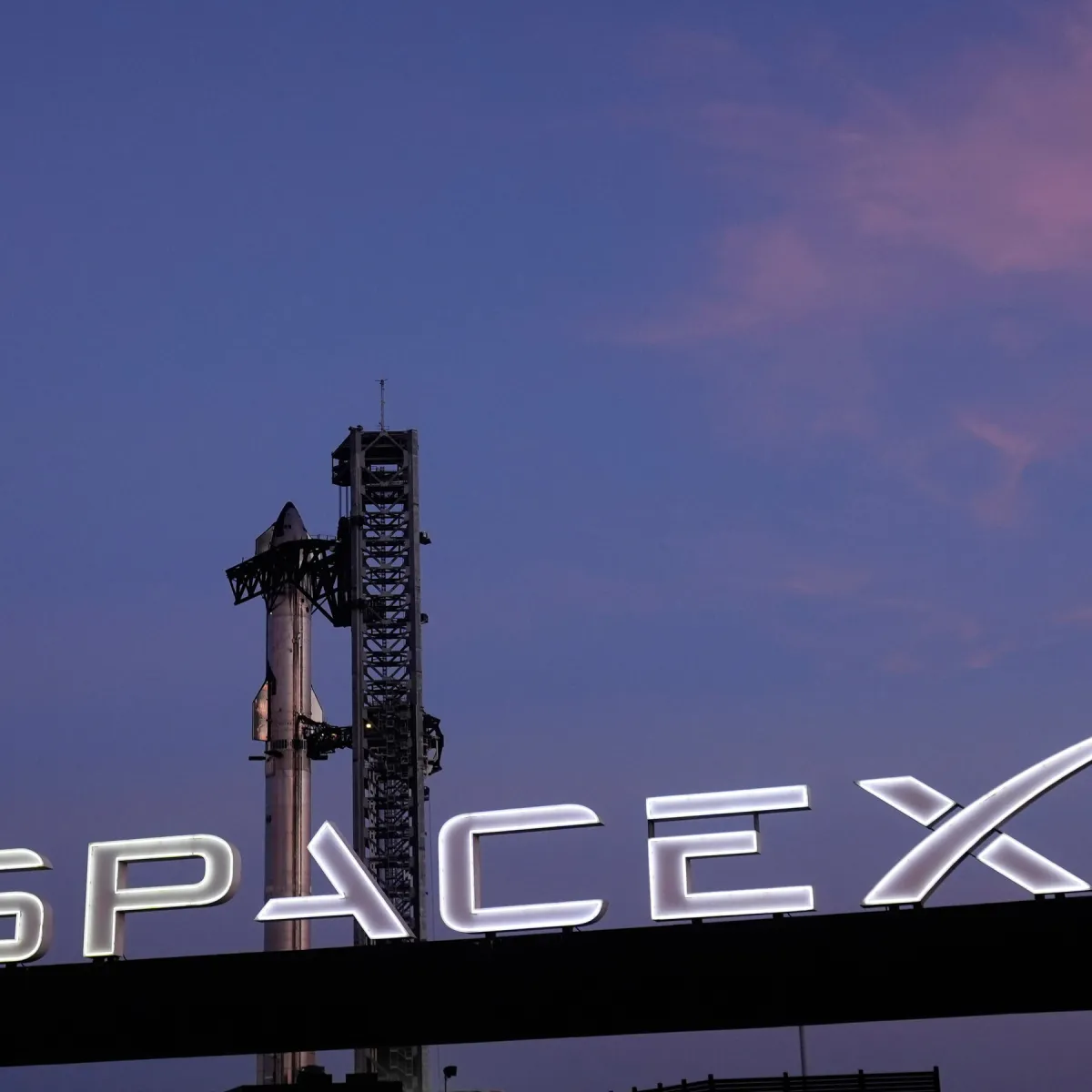 SpaceX rocket launch representing the company's valuation and economic impact