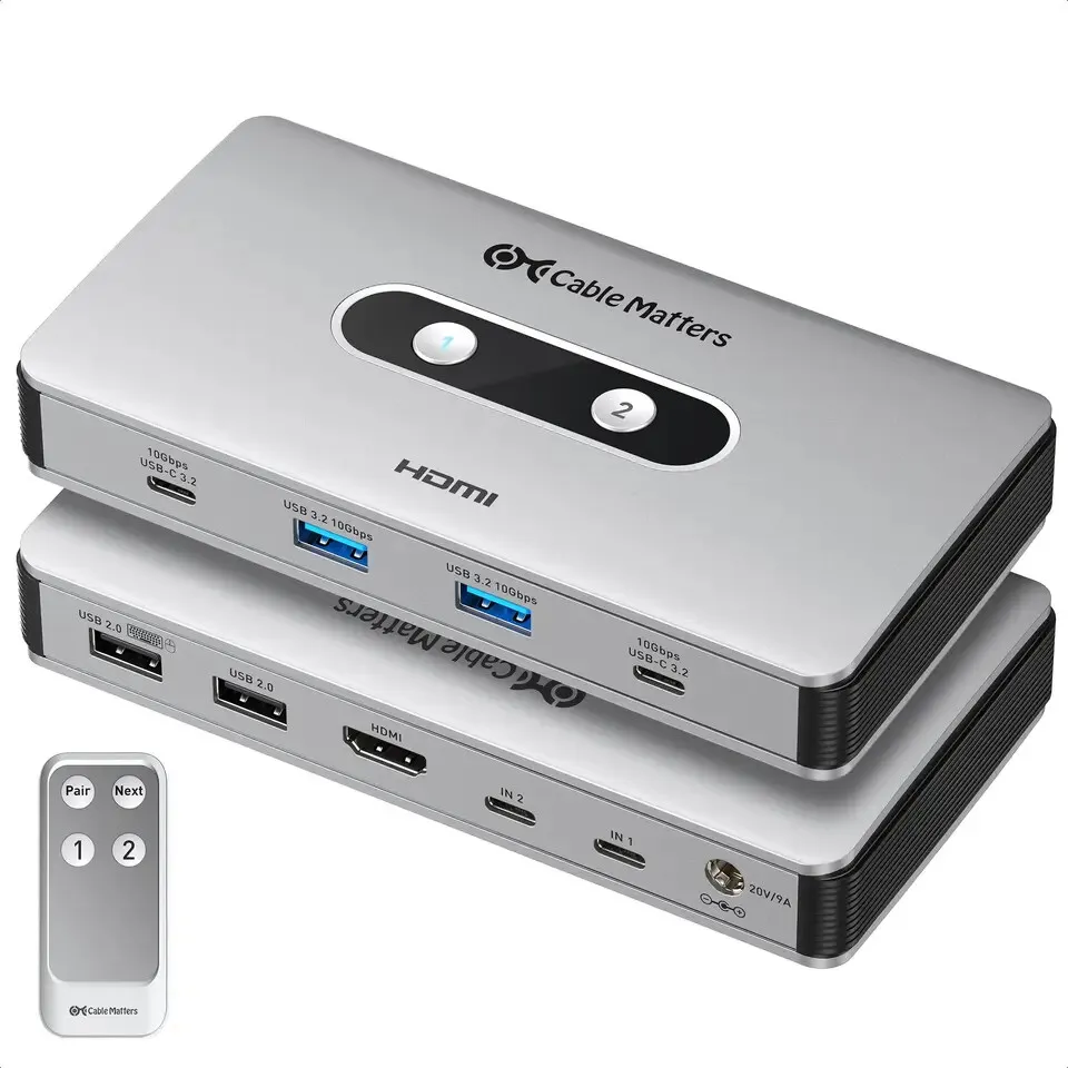 A Cable Matters USB-C KVM switch connects two computers to a single monitor and peripherals while providing charging ports.