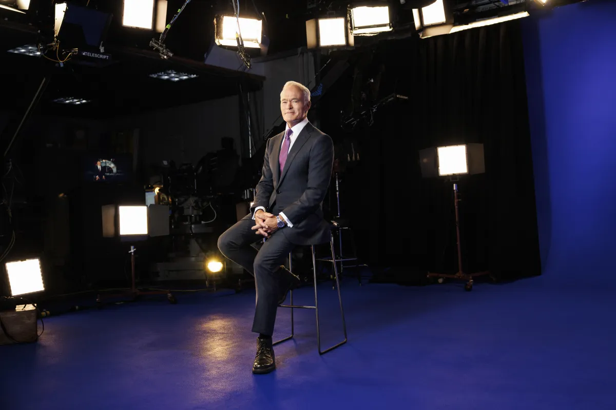 A CBS news broadcast studio and corporate headquarters illustrating media consolidation trends.