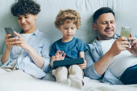 A smartphone screen shows a social media application with an age verification prompt and parental controls