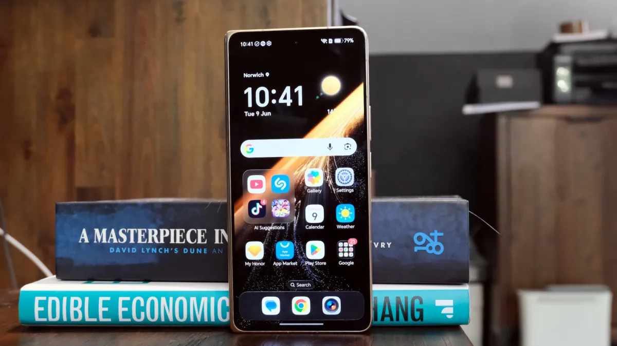 The Honor Magic V6 foldable smartphone is displayed to highlight its slim profile and hinge design.