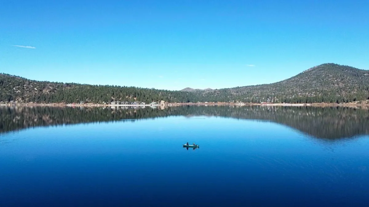 Apple promotional graphic shows a filename pointing to Big Bear as the next major desktop operating system.