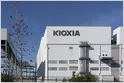Kioxia corporate logo and stock chart illustrate its market value surge.