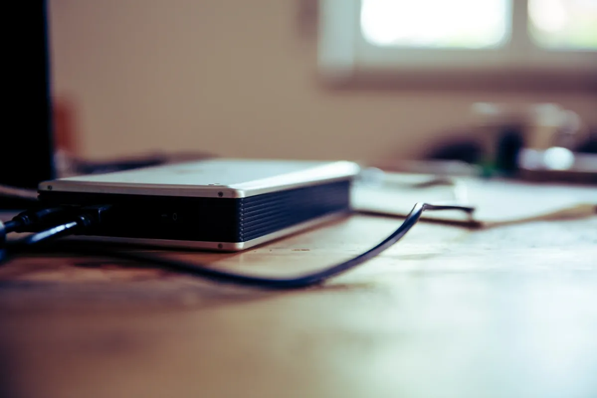 External solid state drives and mechanical hard drives are displayed alongside various connection cables.