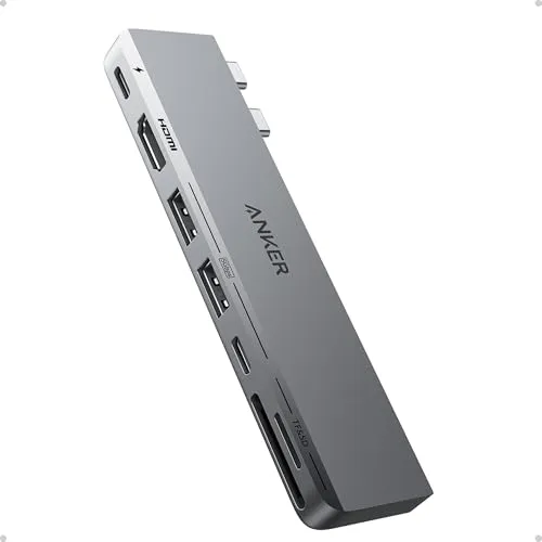 A set of Thunderbolt and USB4 adapters connects to a MacBook for reliable power delivery and external display connectivity.