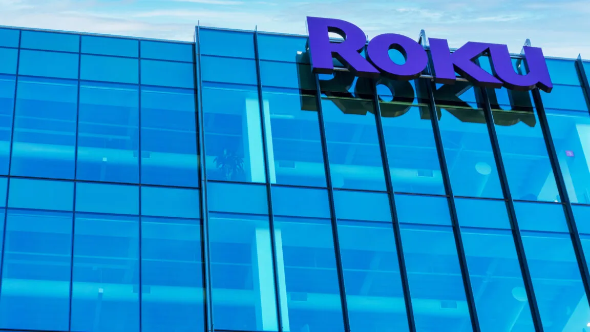 Fox and Roku representatives announcing the 22 billion dollar acquisition deal for smart television advertising.